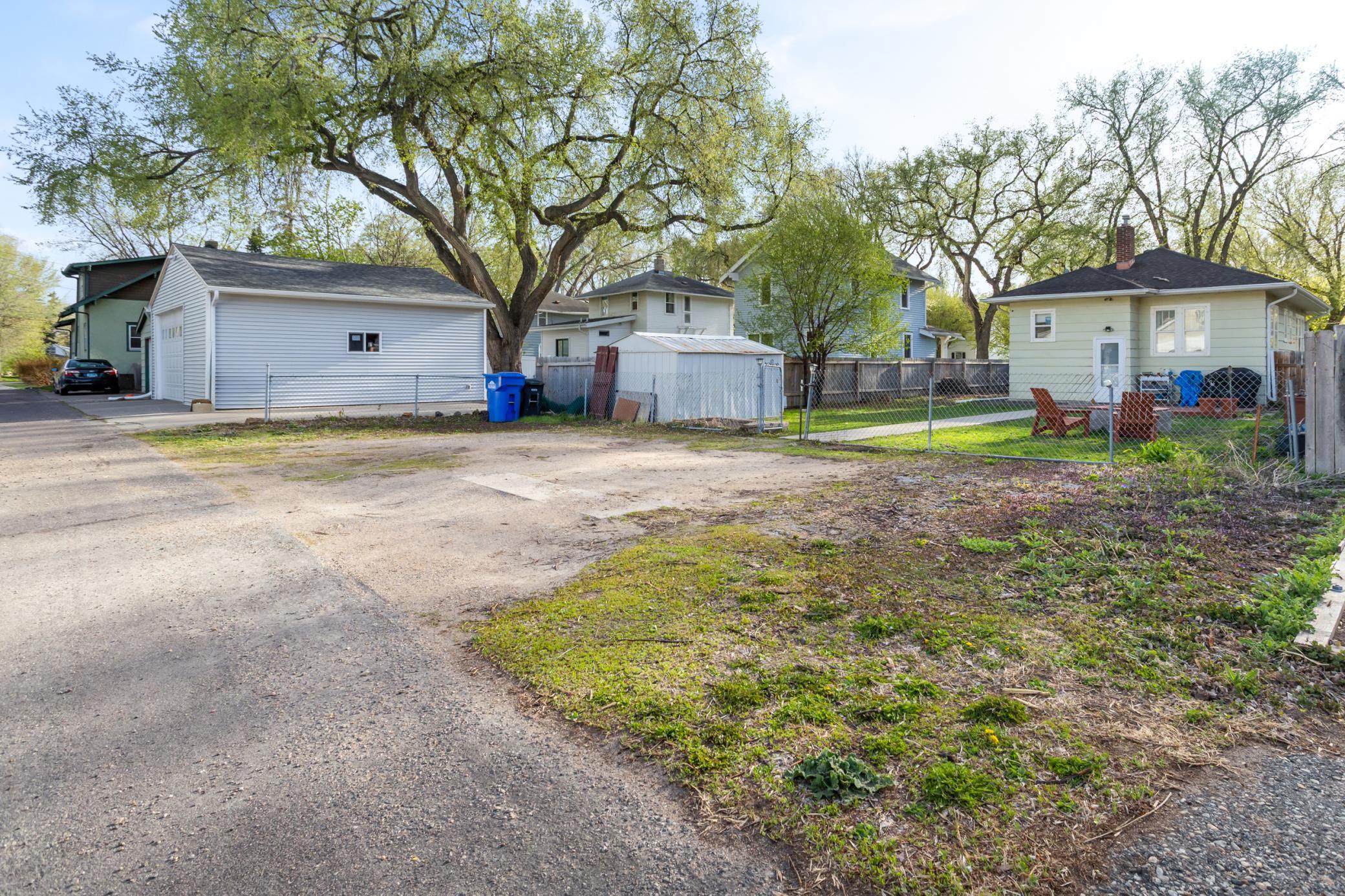 Parking space and storage shed