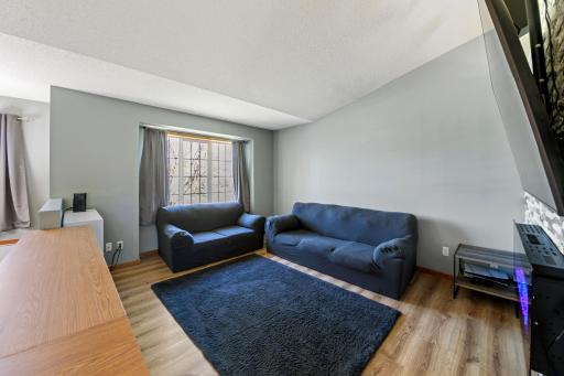 Vaulted ceilings in this living room with fireplace.