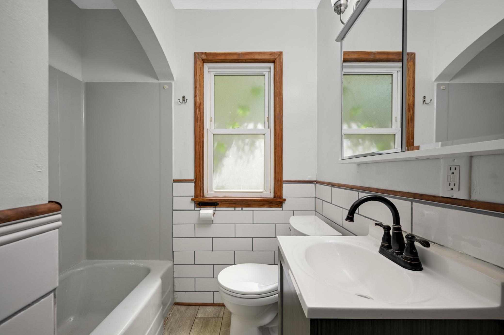 Updated vanity and classic subway tile