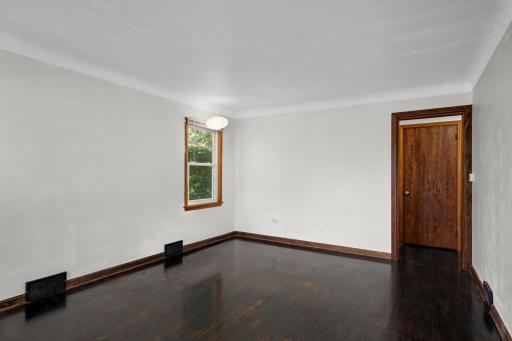 Classic hardwood with fresh, neutral walls and newer windows