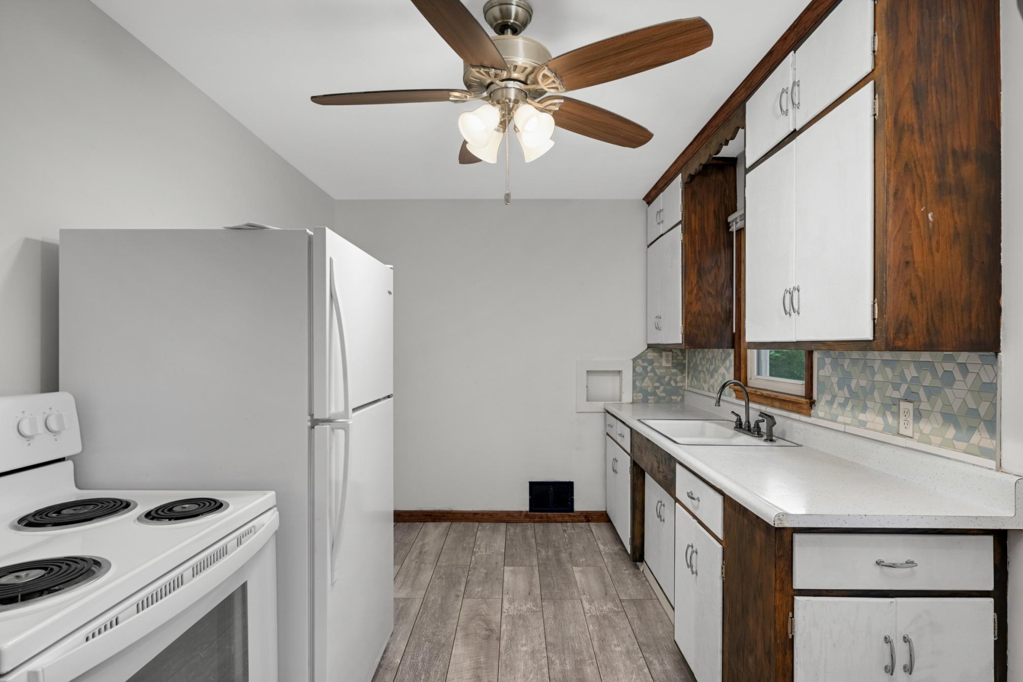 Vinyl flooring throughout kitchen