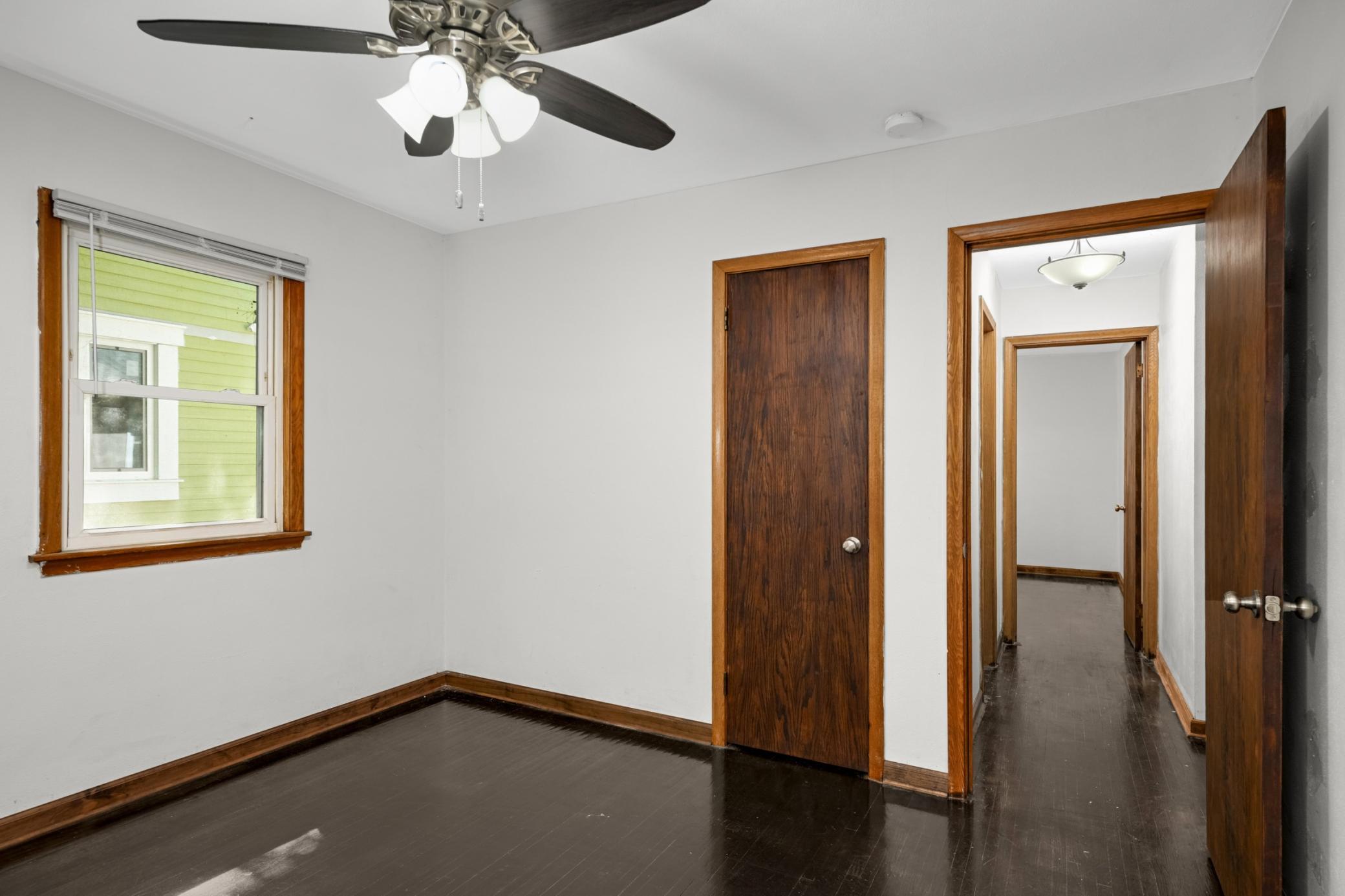 Overhead ceilings fans above both bedrooms
