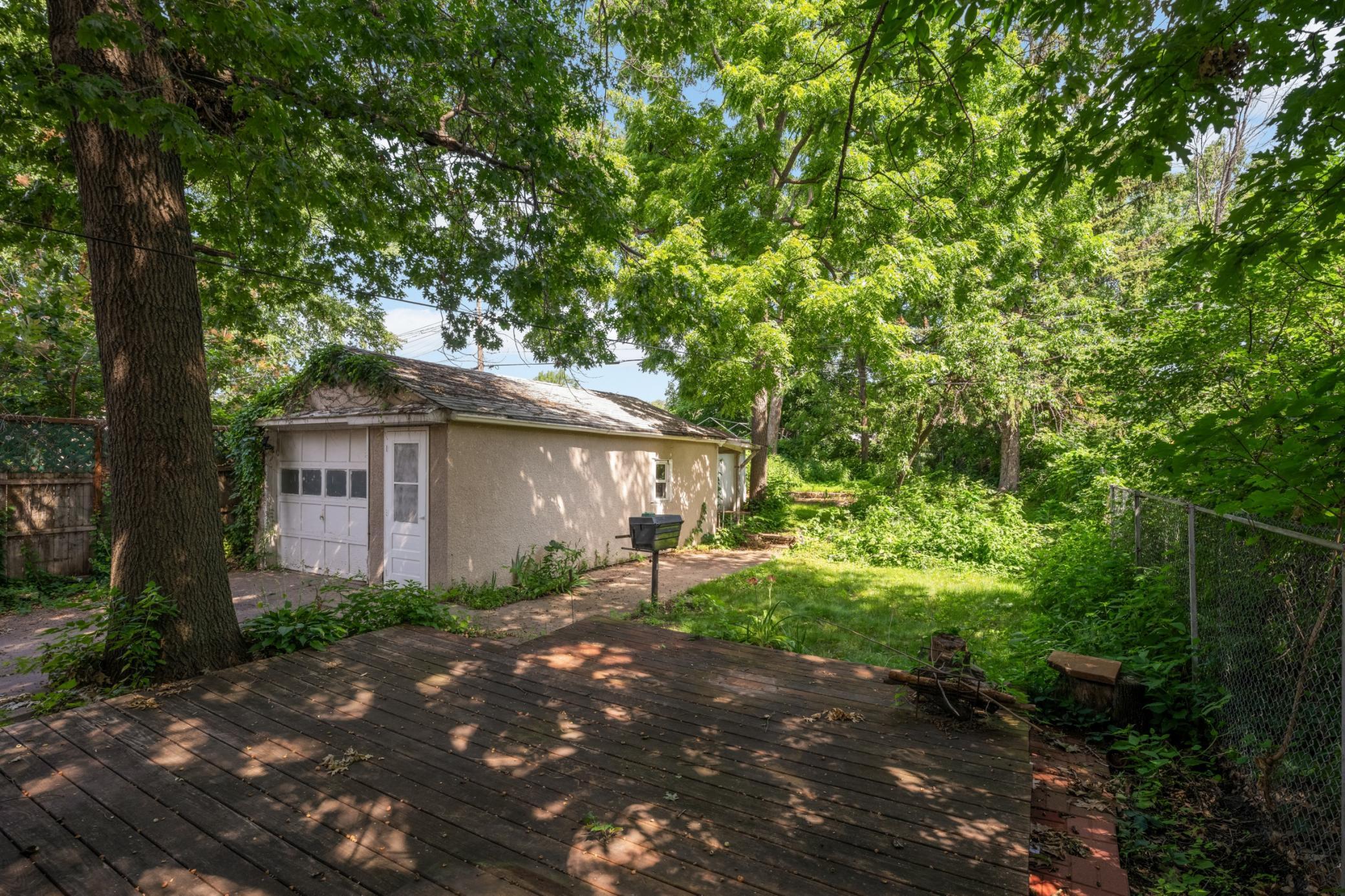 Detached garage and bonus utility shed adds great storage