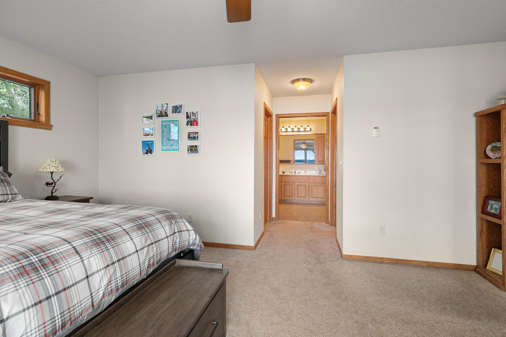 Owner suite looking towards the 2 walk-in closets and Full Bath