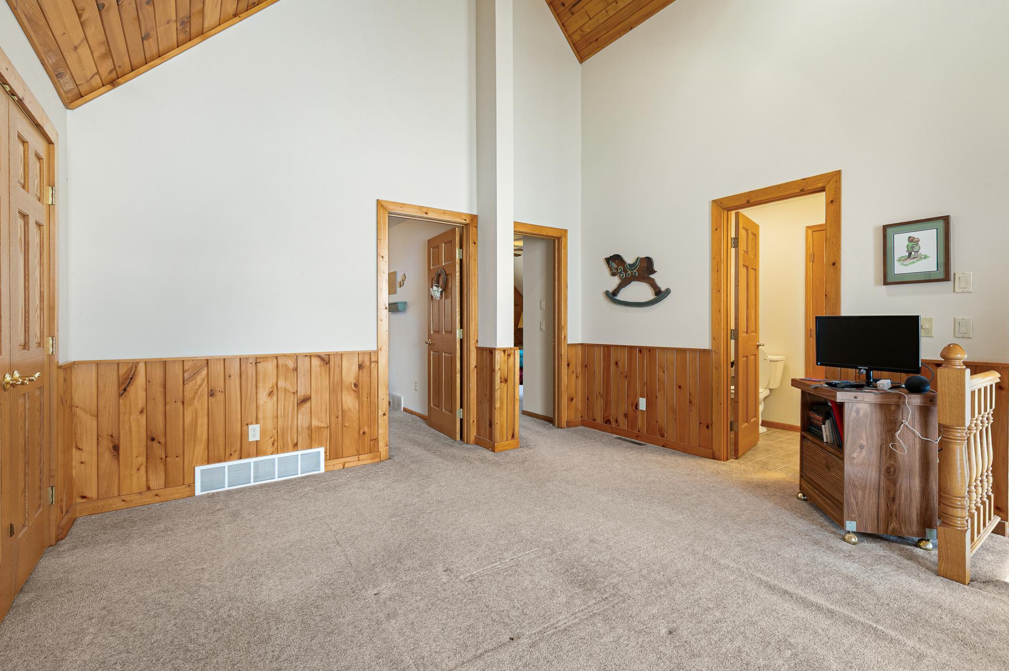 Loft area outside of full bath and 2 bedrooms