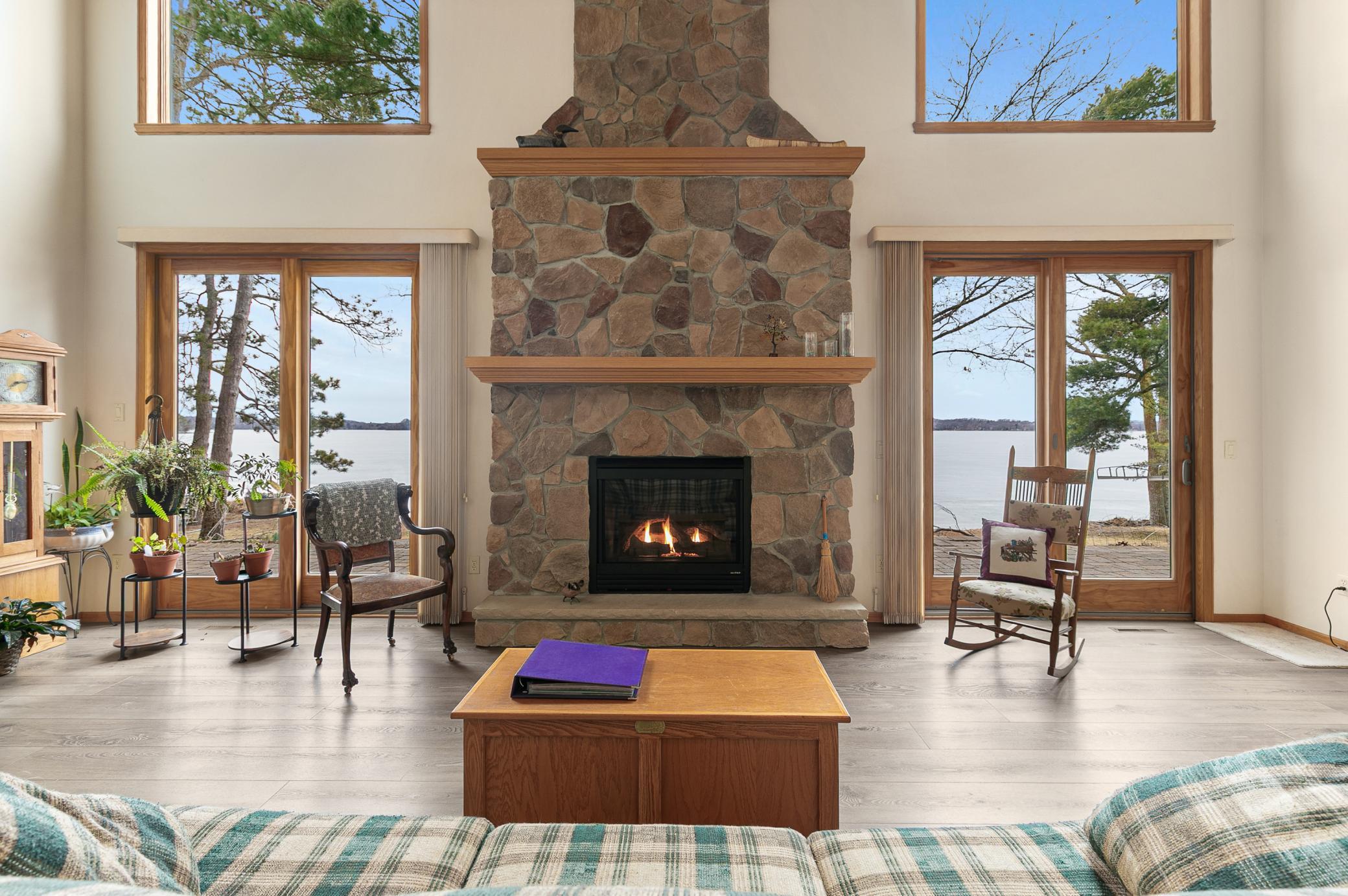 Stone fireplace to the vaulted ceilings