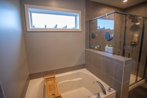 Primary bath with double vanities and separate tub and shower