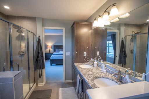 Primary bath with double vanities, separate tub and shower