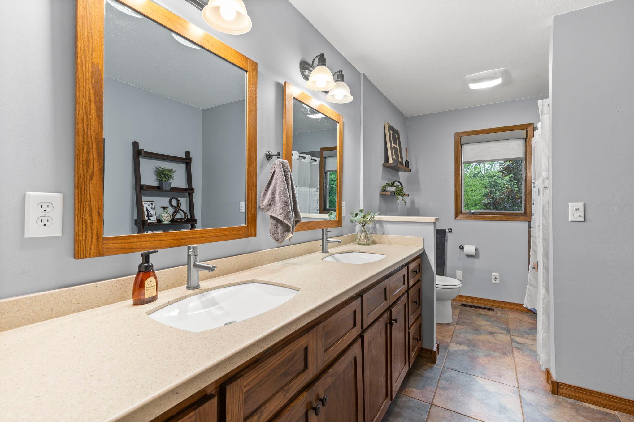Double sinks, tile floors
