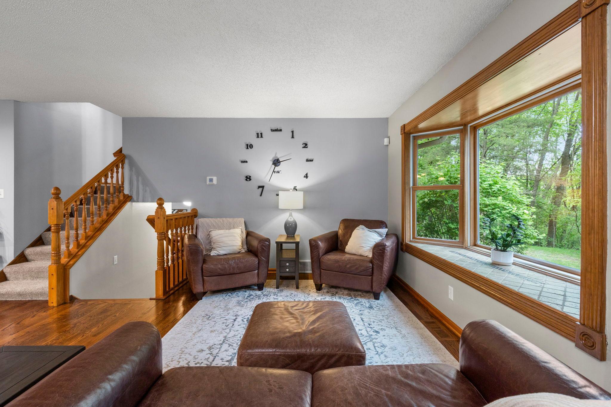 Living room on main w/backyard views