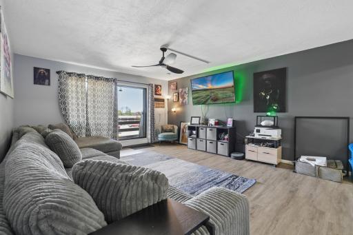 Livin room with sliding glass door to your private balcony