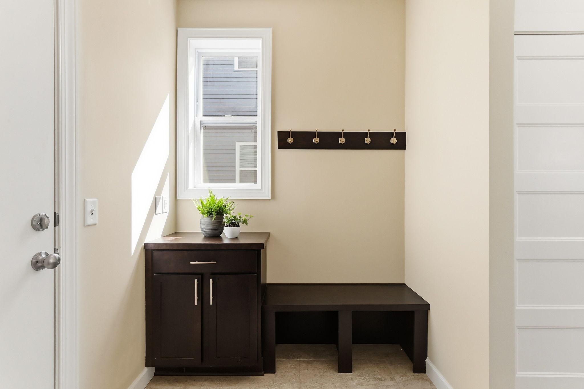 Mud room off garage, with bench