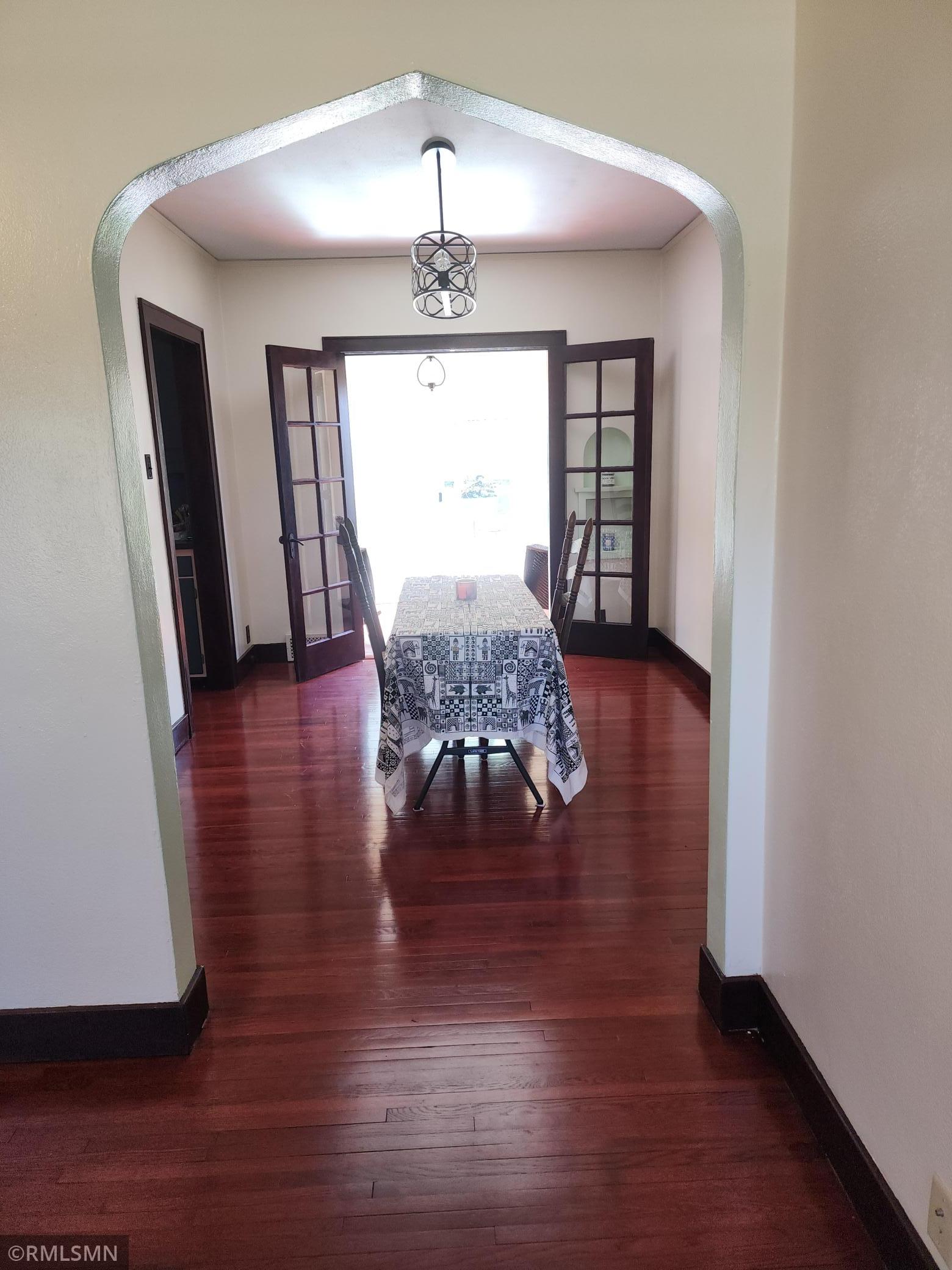 Gorgeous wood floors refinished ceilings lighting fixtures