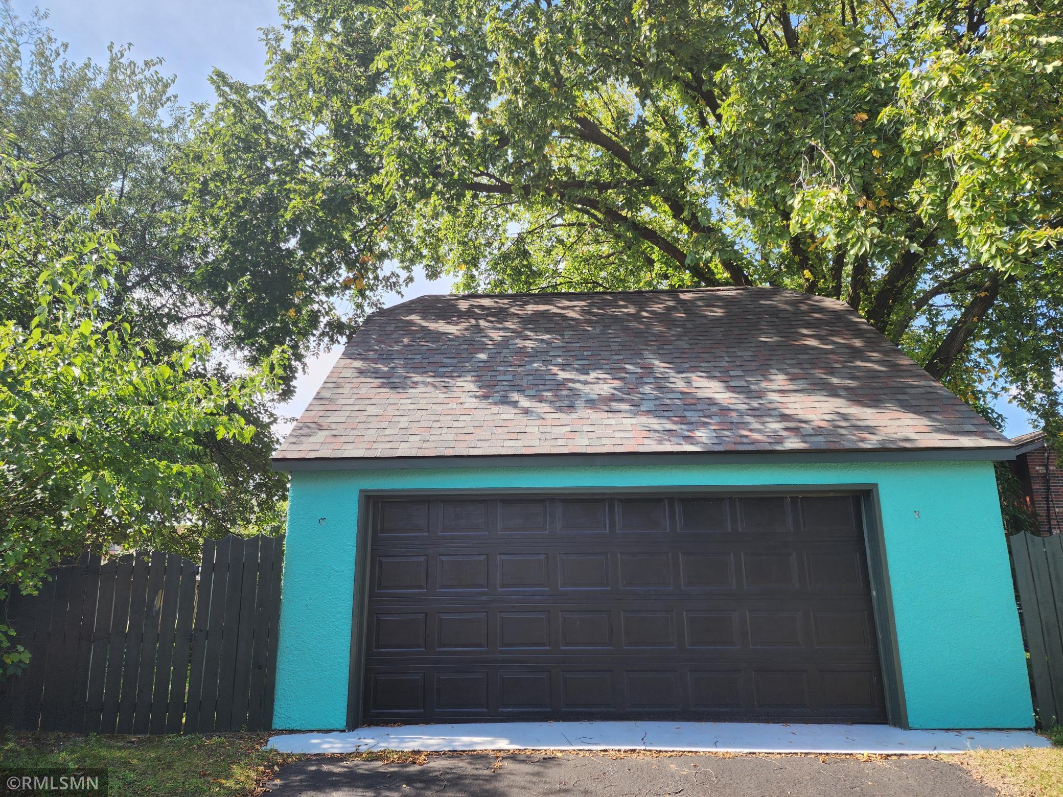 Double garage with future bonus room over garage with a window and door installed for future finishing
