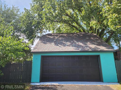 Double garage with future bonus room over garage with a window and door installed for future finishing