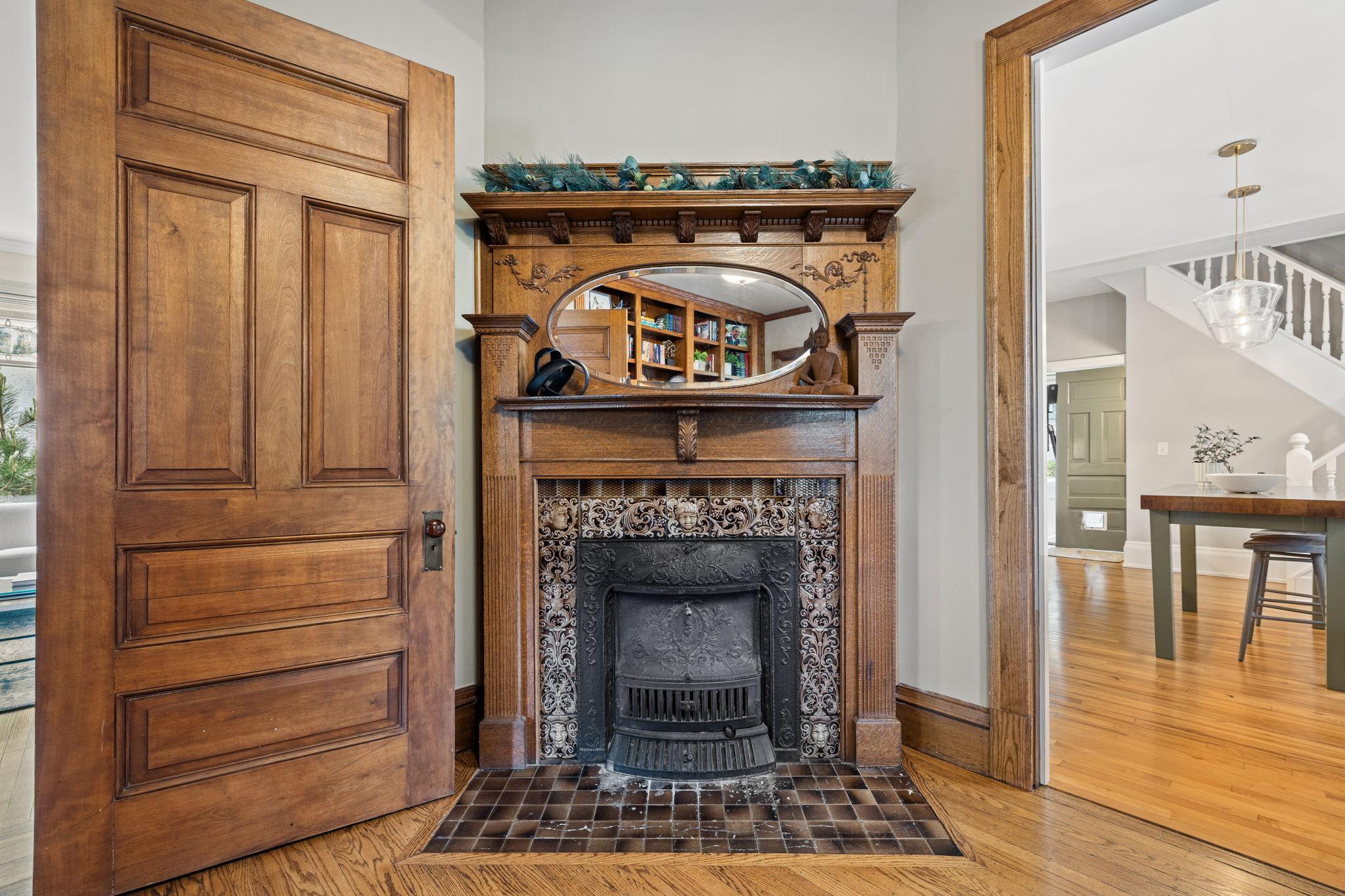 Decorative fireplace in den.