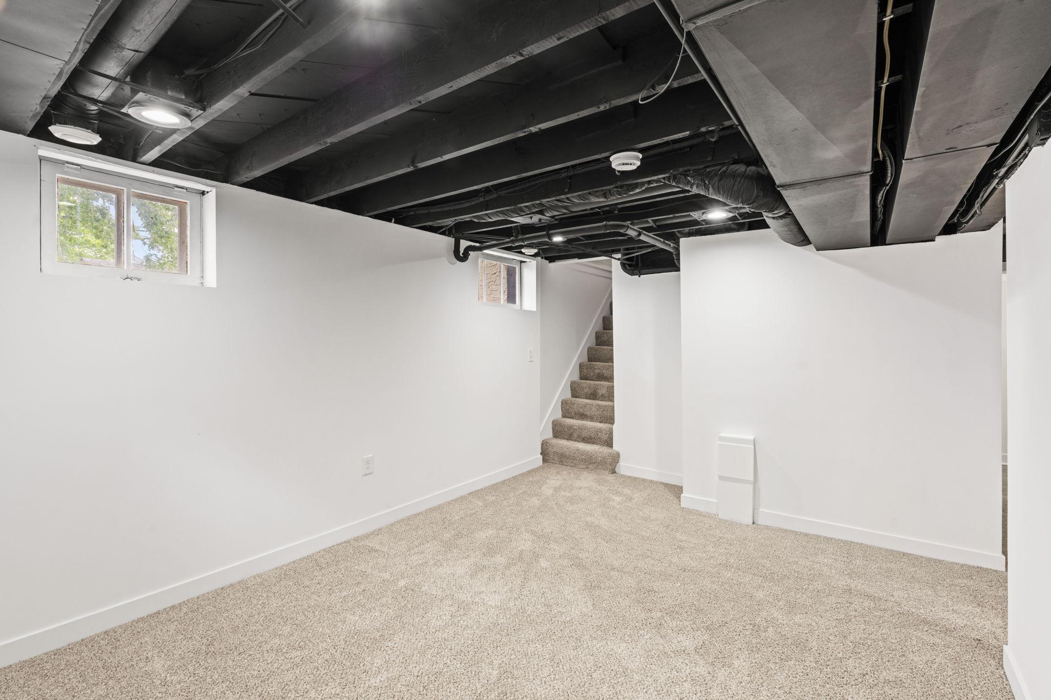 Welcome to the large lower level family room.