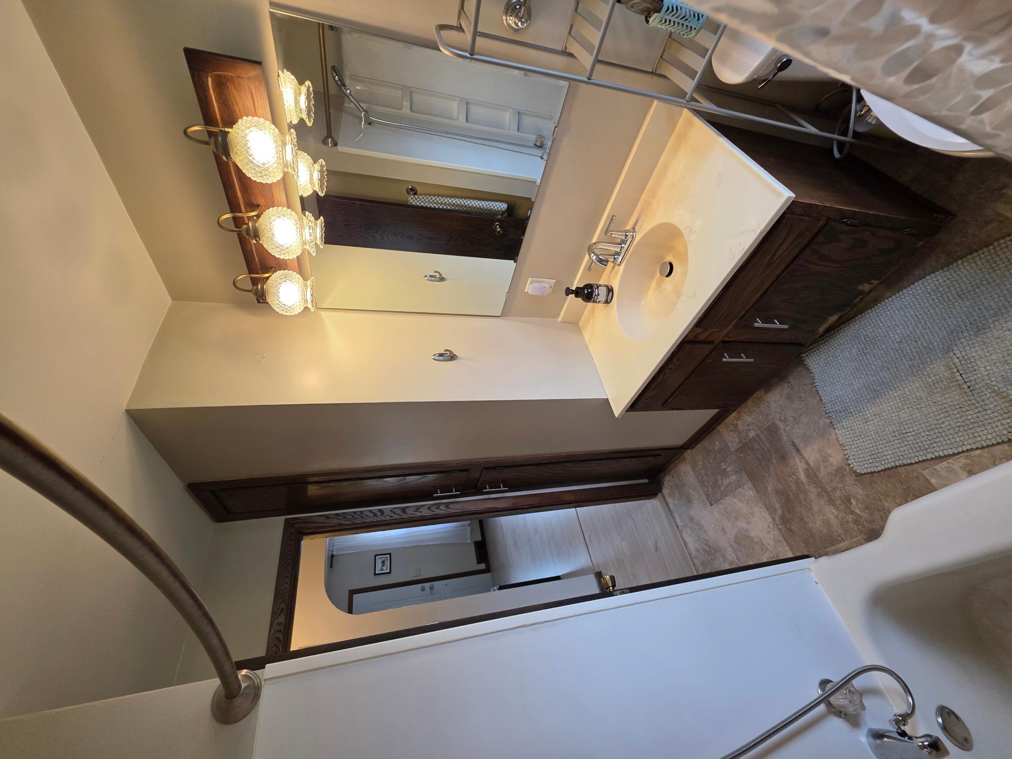 29 Main Level Bath with Built in Cabinet.jpg