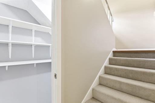 And there's a BIG storage closet off of the stairs. Nice 2-car garage- with "typical cracked concrete", same as when they bought.