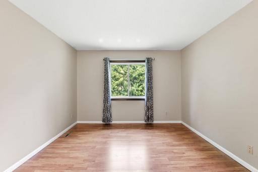Lots of BEDROOM OPTIONS- the largest BR is on the living room level and walks thru to a nice closet ....