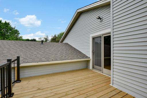 Sunny- south and west exposure. The low wall is the 2-car garage. EVEN THE DECK LED light is new.
