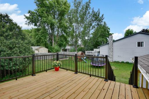 Lovely neighborhood view from the generous, recently refurbished deck. The sellers wanted this house to be totally ready for YOU!