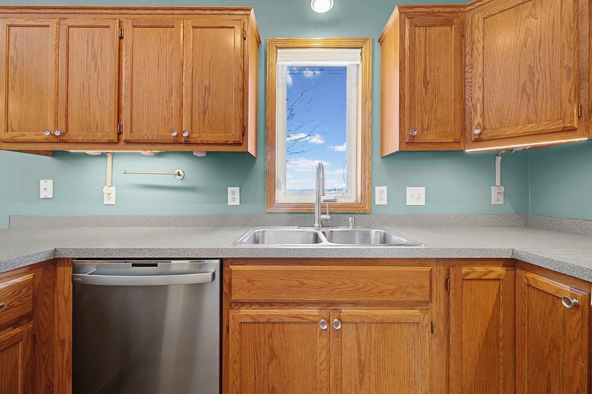 Sink window overlooking backyard