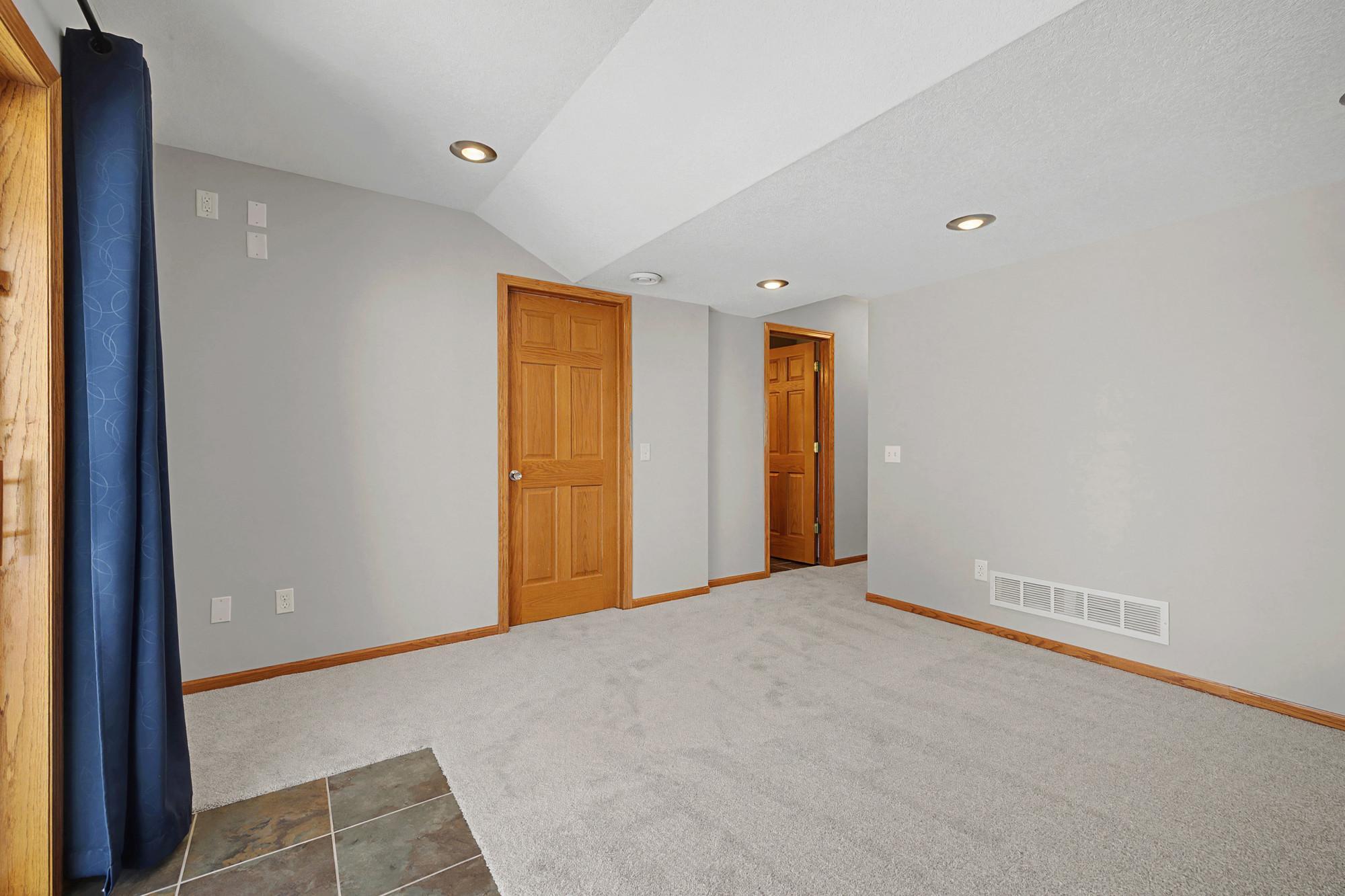 Lower Walkout family room with new carpet