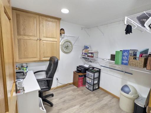 The lower level has a little nook that currently is being used an office but also could be another storage area if need be.