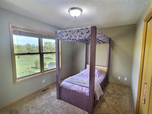 This bedroom sits on the golf course side so nice view of the outside.