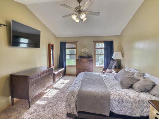 The upper level features three spacious bedrooms and two bathrooms, including a private primary suite complete with a walk-in closet and private bath.