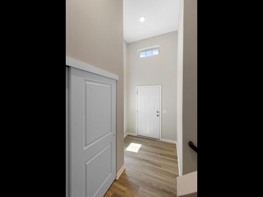 Foyer. Photo taken of another home with similar plan and finishes. Photos and renderings may not depict actual plan, materials, & finishes may vary. All measurements are approximate.