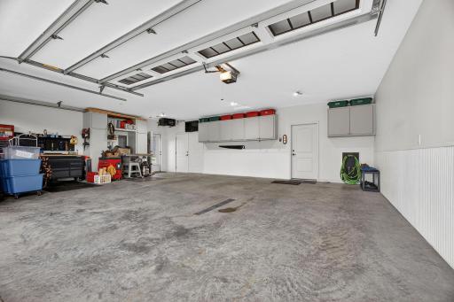 This isn't just a garage â it's a workspace, workshop, and haven. Heated and oversized with softened hot water, floor drain, custom built-in storage, plus direct access to the RV parking pad and patio.