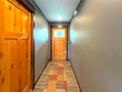 Welcoming foyer with can lighting and pocket door coat closet leads your to the open concept main level.