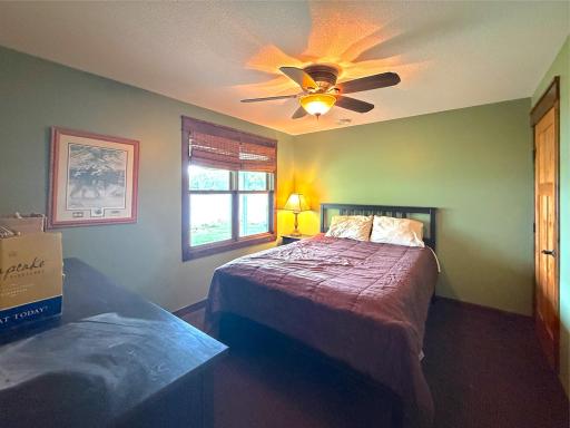 Spacious bedroom with a roomy closet for all your storage needs.