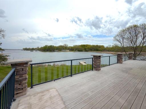 The main-level maintenance-free deck showcases breathtaking views, creating the perfect space for outdoor relaxation.