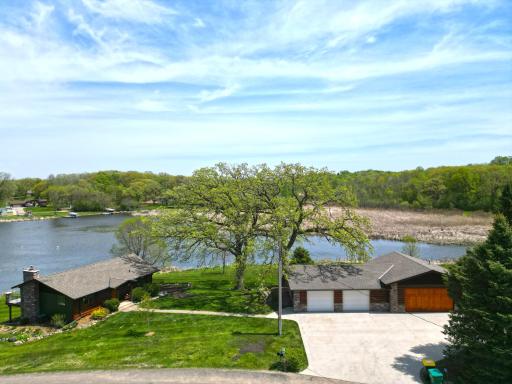 Nestled on 1.3 acres of well-kept landscape, this half-log home is completely move-in ready and ideal for creating lasting memories.