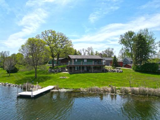 Stunning 3 bedroom, 2 bathroom home set on the shores of Cedar Lake with panoramic views.