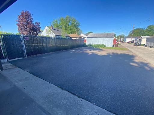 Expansive parking pad ideal for guests or extra vehicles