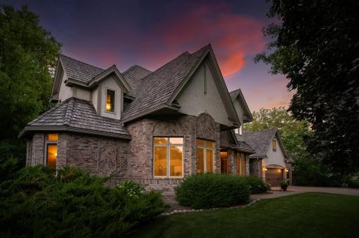 Custom built home offers intense detail on the exterior with bay windows, and bump out for additional dimensions to the front elevation