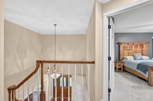 Upper level offers openness into the separate bedrooms as well as overview of the foyer