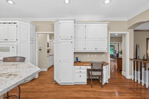 Lots of storage spaces in the kitchen/ dinette area, plus a space to use as a desk.