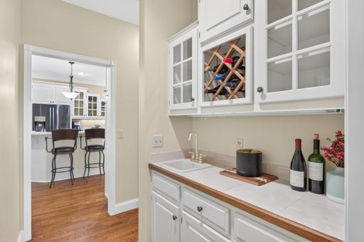 Additional bonus is a space for serving from or great when entertaining as it is located between the Formal Dining Room and Kitchen