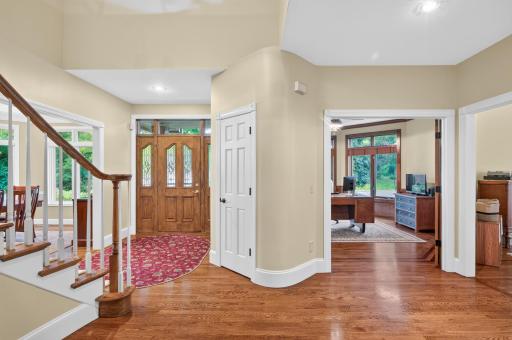 Appreciate the detail throughout the home with enameled woodwork, 6" trim boards, paneled doors, varying ceiling heights, openings to room wrapped in trim adding additional detail