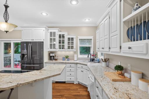 Plenty of countertop space, stacked drawers and paneled cabinetry doors