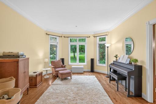 Flex room can be good for a music room as well. Looks out on side yard, and adjoins to the family room