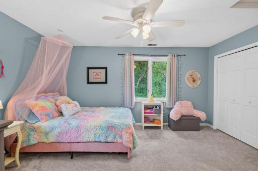What s not to love about this childs bedroom. Extra space in the closet, window overlooking treed lot