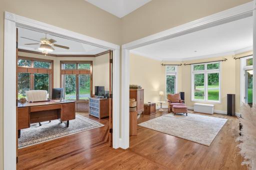 Outside the office space is a multi purpose room. Great for a Playroom, Living Room, Movie night, or what your need may be. Surrounded by windows allowing extra brightness to shine through