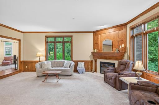 Family room steps into FLEX ROOM, views of side yard and backyard.