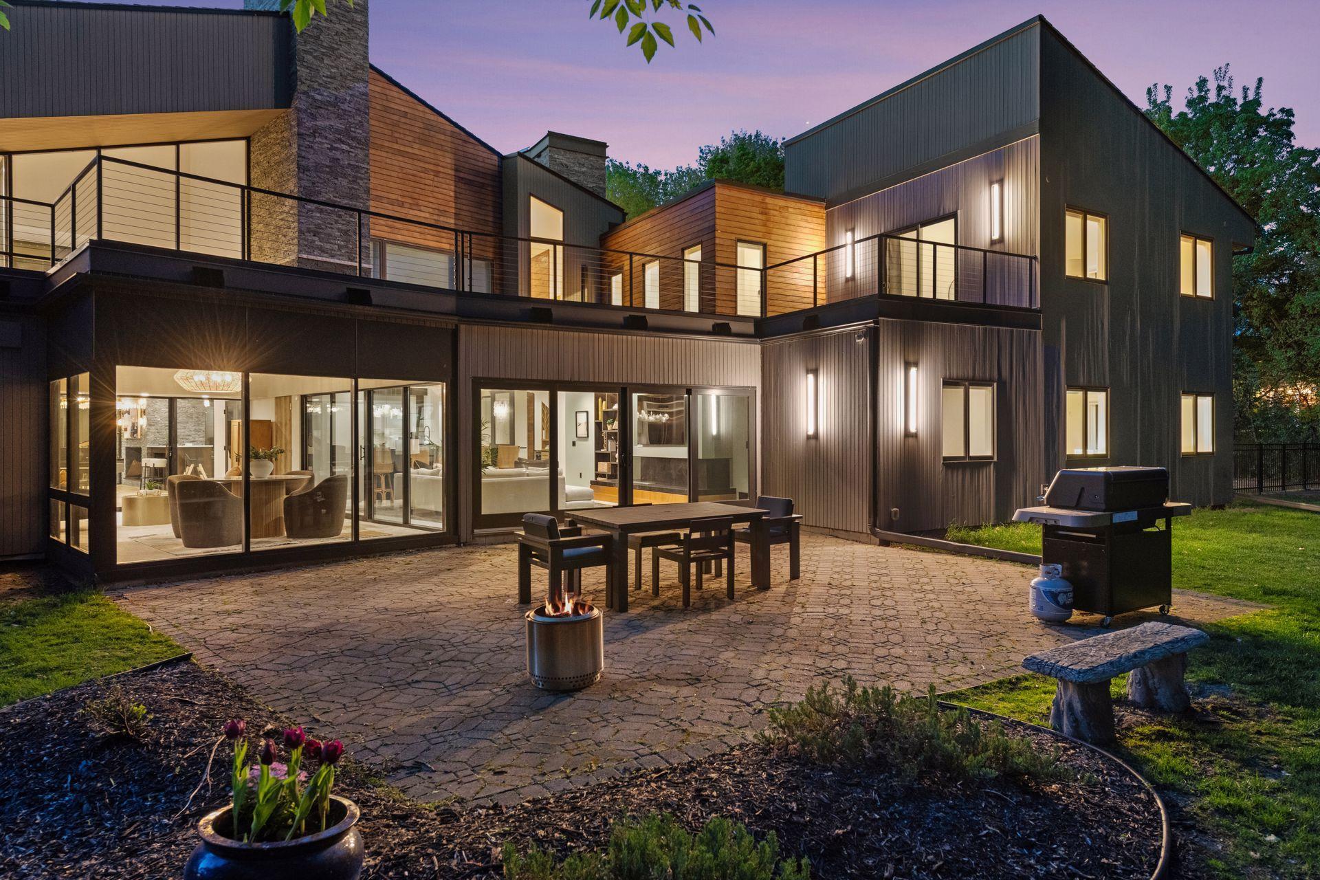 Outside, enjoy the beautifully landscaped grounds, spacious patio, and four-car attached garage.